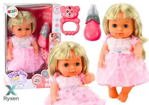 Lalka W Jasno-Różowej Sukience Siusiająca Butelka Grzechotka Dźwięki LEAN TOYS
